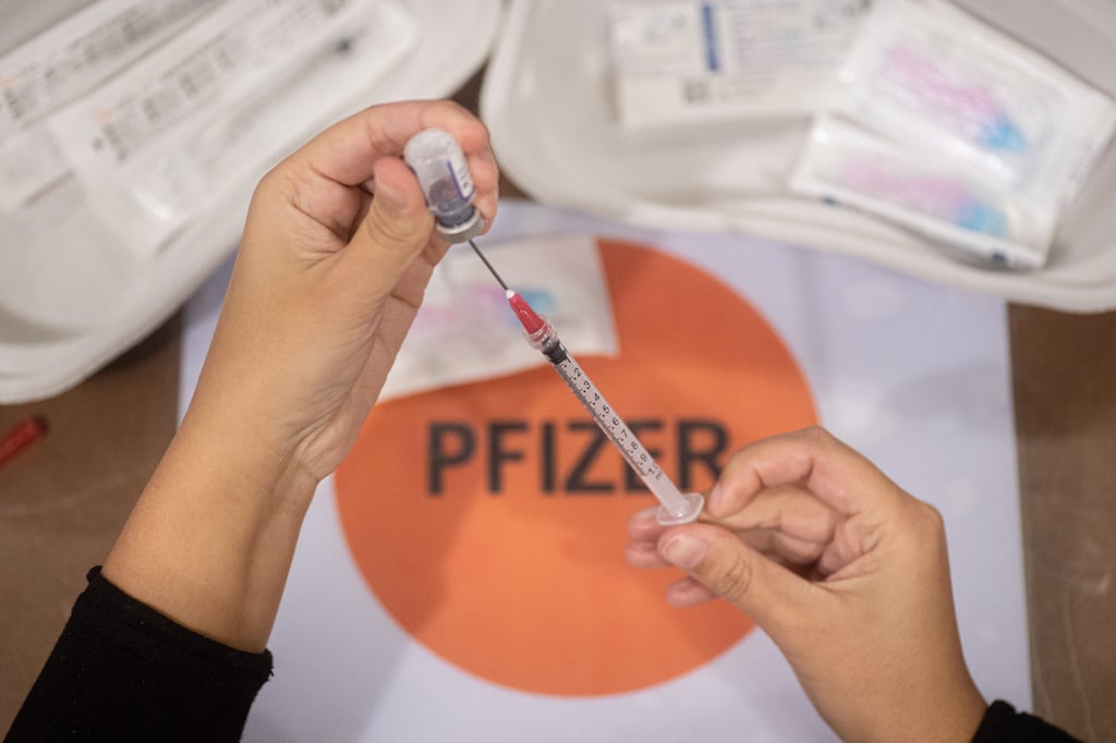 A healthcare worker prepares the Pfizer-BioNTech Covid-19 vaccine in Eindhoven in 2022. Photo: via Getty Images A healthcare worker prepares the Pfizer-BioNTech Covid-19 vaccine in Eindhoven in 2022. Photo: via Getty Images