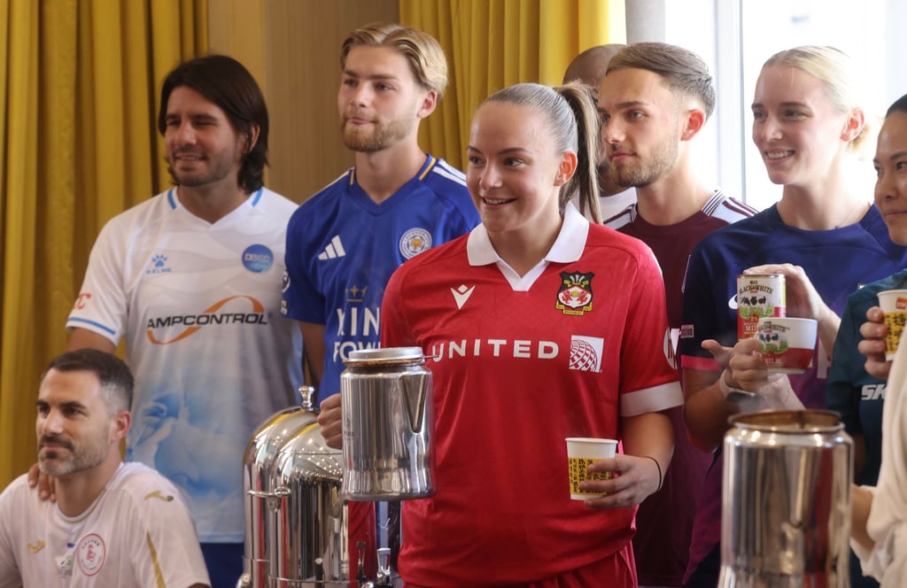 The HKFC Soccer Sevens captains learn to make milk tea. Photo: Jonathan Wong The HKFC Soccer Sevens captains learn to make milk tea. Photo: Jonathan Wong