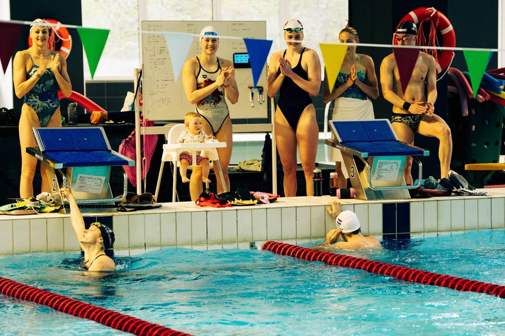 Siobhan Haughey (standing second from left) with training teammates including Barbora Seemanova (left) and Adam Chillingworth (right). Photo: Tom Rushton