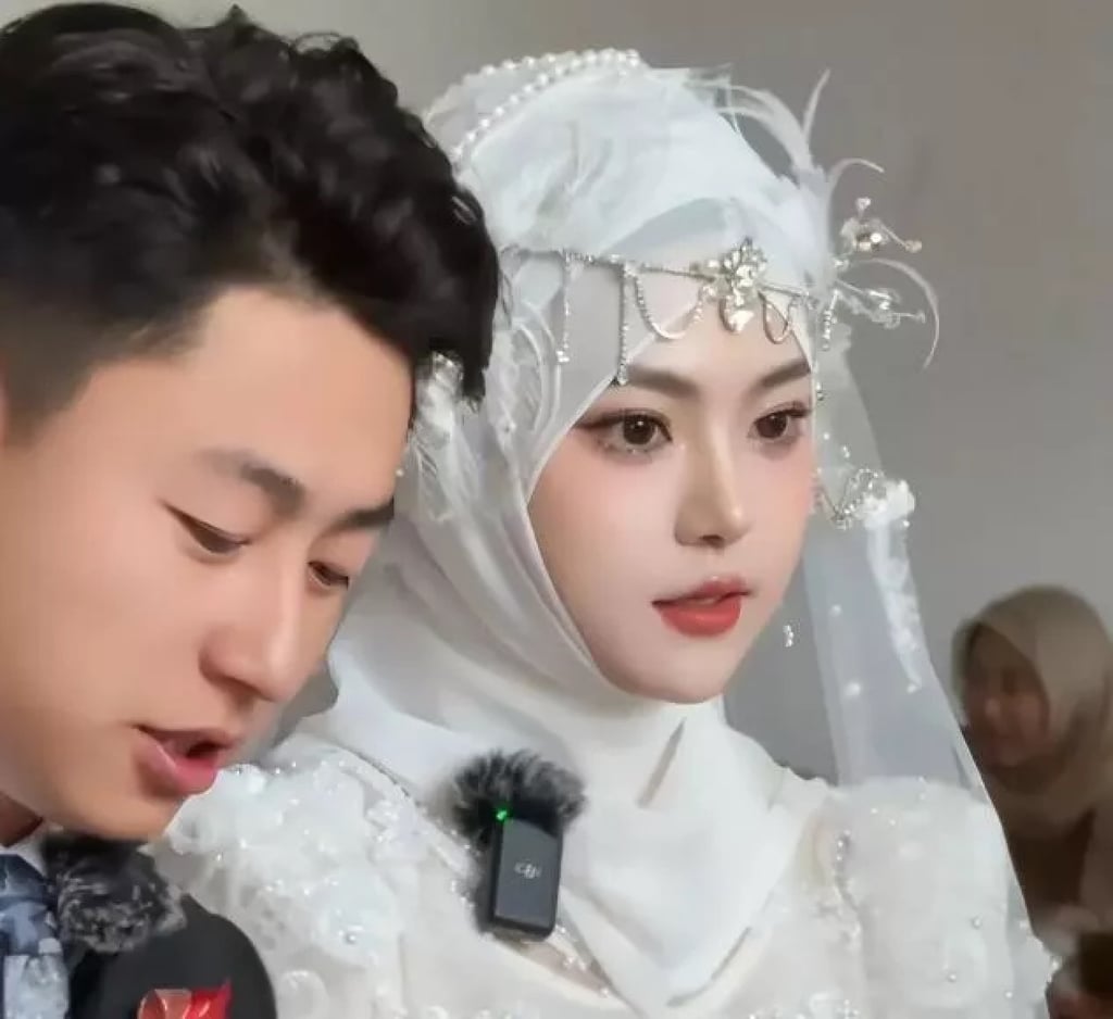 The groom and his bride, who have not been fully identified, have caused a major stir on social media. Photo: Weibo The groom and his bride, who have not been fully identified, have caused a major stir on social media. Photo: Weibo