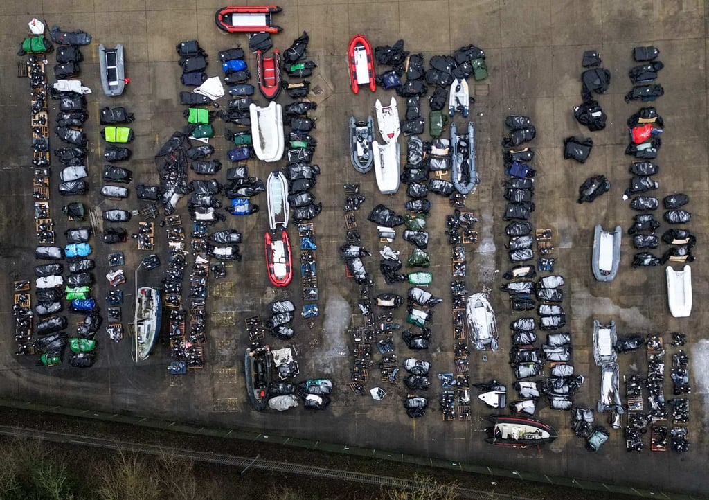 Inflatable boats and outboard engines used by migrants who were picked up at sea while crossing the English Channel from France. File photo: AFP Inflatable boats and outboard engines used by migrants who were picked up at sea while crossing the English Channel from France. File photo: AFP