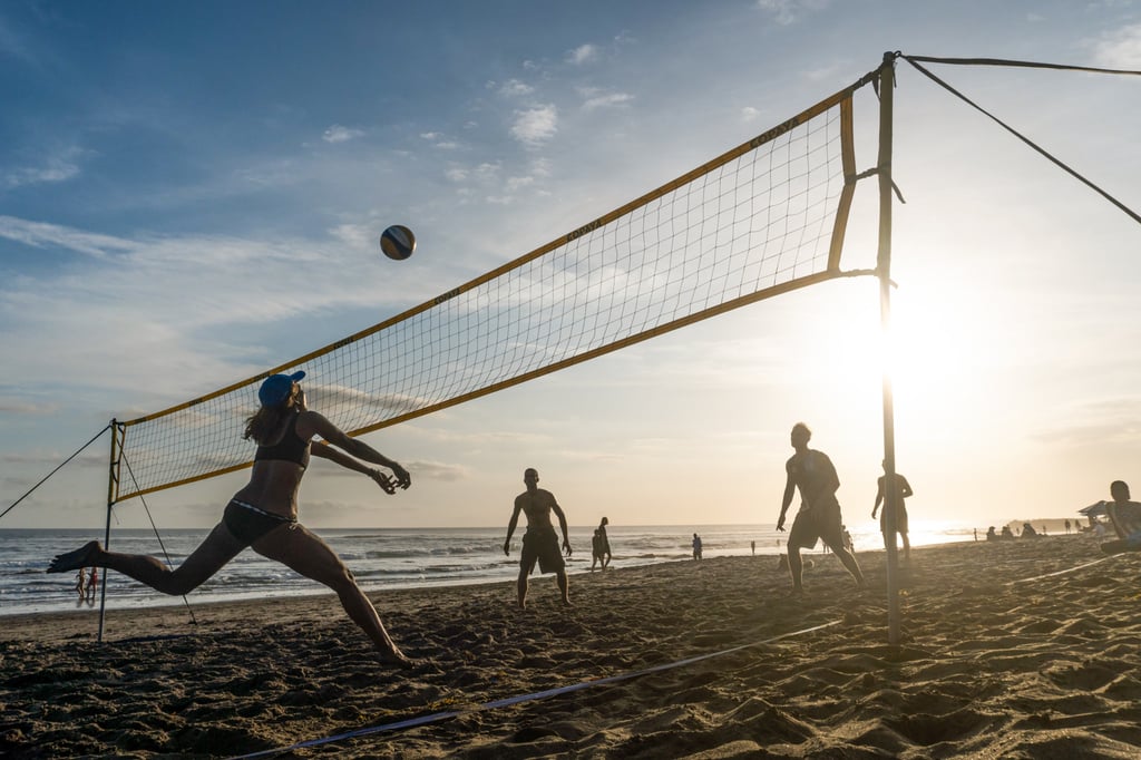 A sunset game of beach volleyball. Photo: Getty Images A sunset game of beach volleyball. Photo: Getty Images
