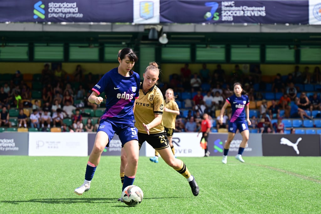 Lili Jones (right) challenges for the ball against Kitchee. Photo: HKFC Standard Chartered Soccer Sevens