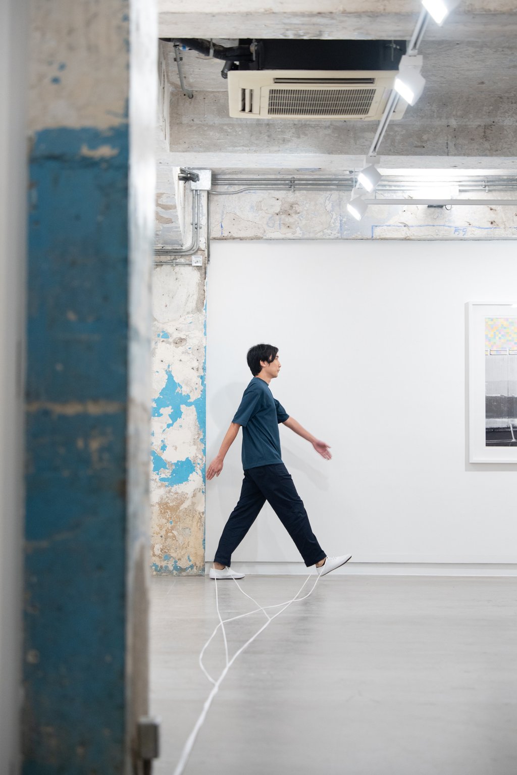 South Ho performs Me, My White Sneakers, and Shoelaces at Blindspot Gallery in Wong Chuk Hang, Hong Kong, on May 10, 2025. Photo: Ray Leung courtesy of artist and Blindspot Gallery South Ho performs Me, My White Sneakers, and Shoelaces at Blindspot Gallery in Wong Chuk Hang, Hong Kong, on May 10, 2025. Photo: Ray Leung courtesy of artist and Blindspot Gallery