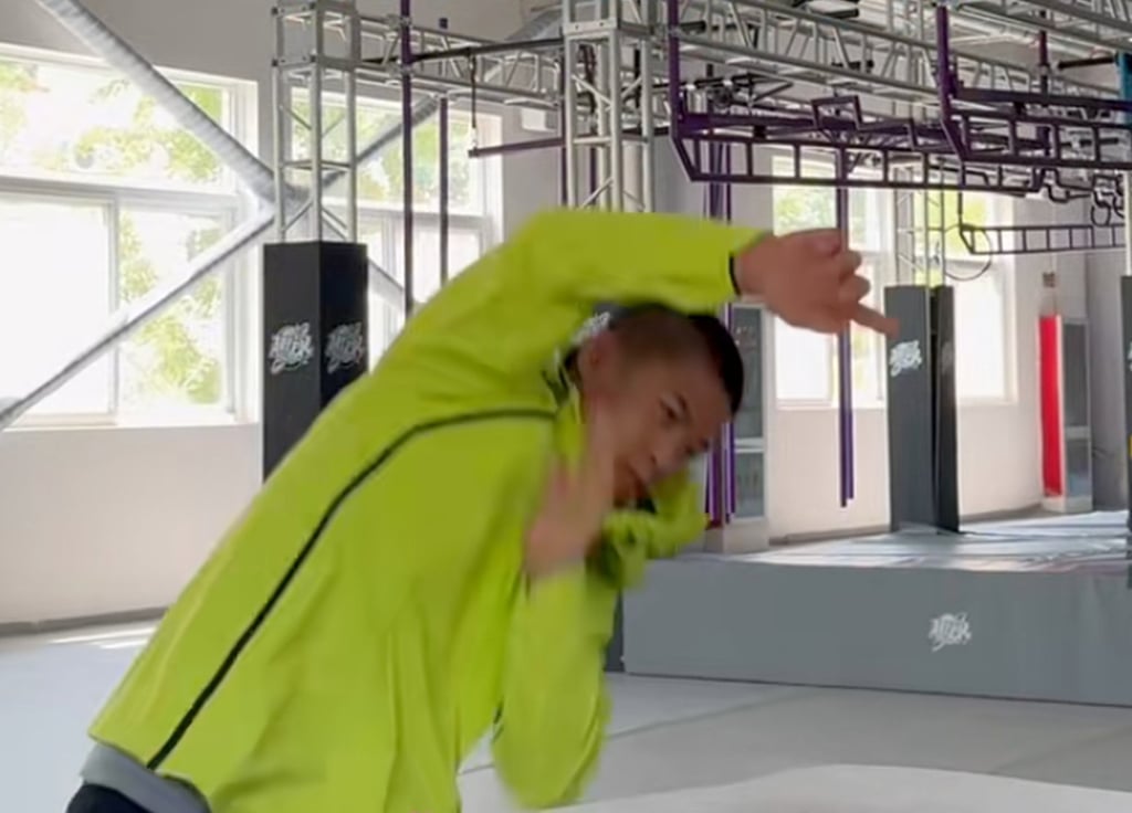 Zhao Honggang trains by slapping down hard on a cushion ahead of the contest. Photo: Douyin Zhao Honggang trains by slapping down hard on a cushion ahead of the contest. Photo: Douyin