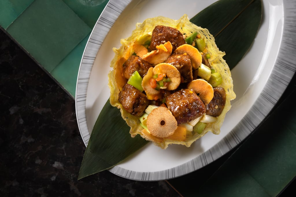 The marbled tenderness and fragrant black peppercorns of the wok-fried Kagoshima Wagyu beef takes centre stage. The marbled tenderness and fragrant black peppercorns of the wok-fried Kagoshima Wagyu beef takes centre stage.