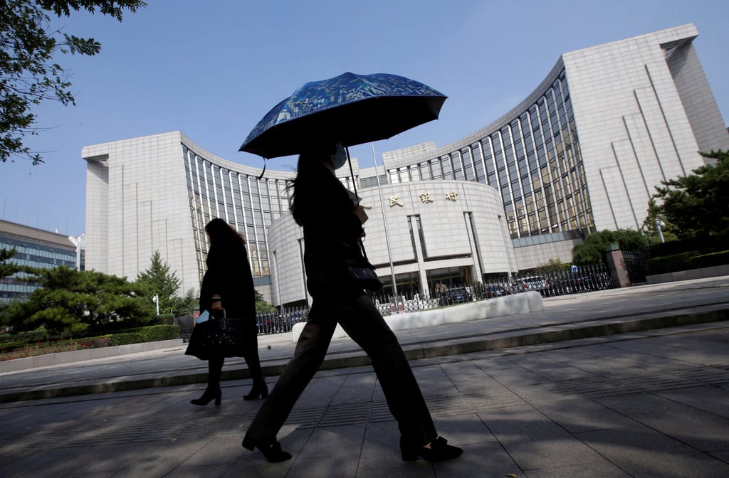 The People’s Bank of China on Tuesday cut its key rates by 10 basis points. Photo: Reuters The People’s Bank of China on Tuesday cut its key rates by 10 basis points. Photo: Reuters