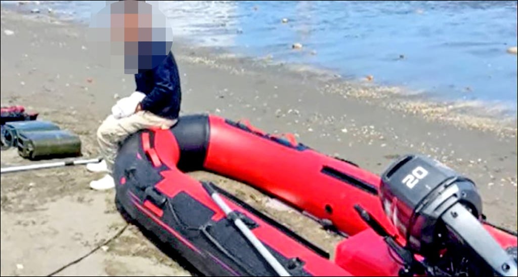 A father and son from mainland China crossed the Taiwan Strait using an inflatable boat. Photo: Handout A father and son from mainland China crossed the Taiwan Strait using an inflatable boat. Photo: Handout