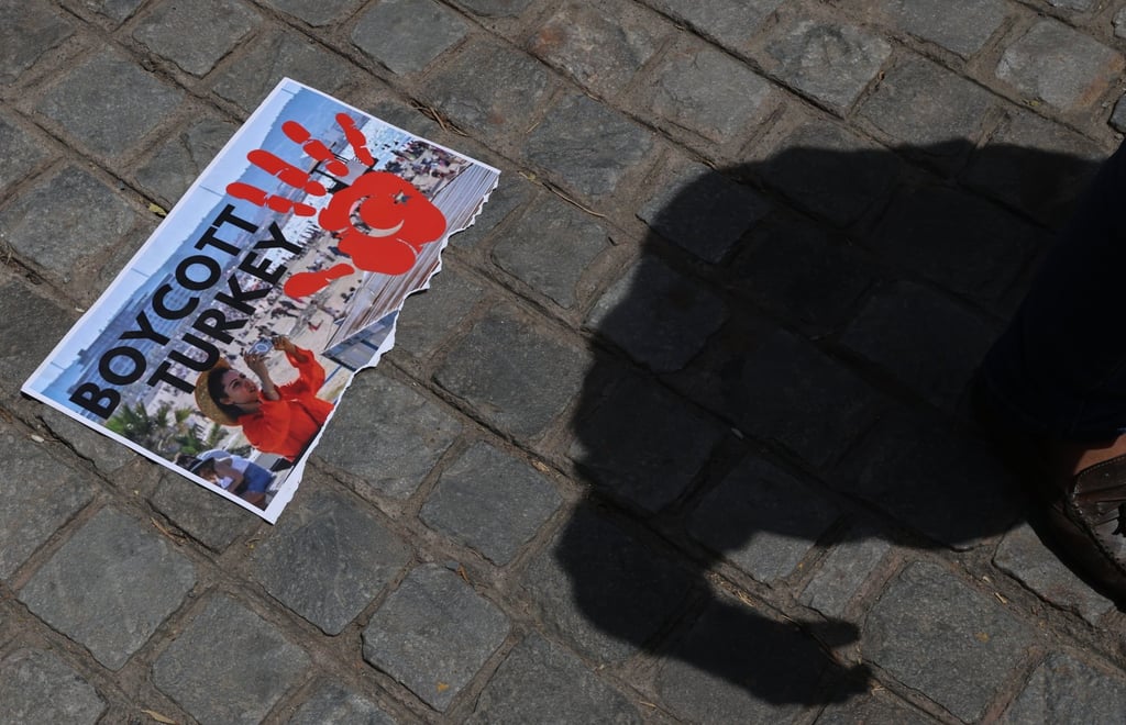 A torn placard is seen on the ground in New Delhi on Friday during a protest against Turkey. Photo: EPA-EFE A torn placard is seen on the ground in New Delhi on Friday during a protest against Turkey. Photo: EPA-EFE