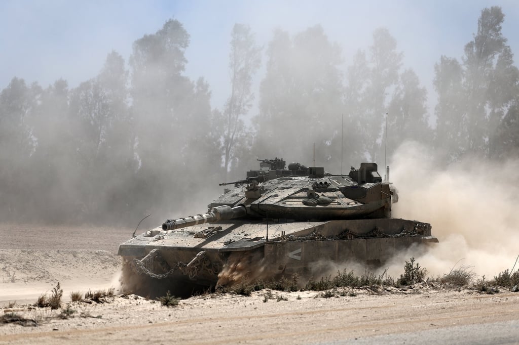 An Israeli tank manoeuvres near Khan Yunis, on May 20 as Israel’s military continued to strike targets across the Gaza Strip. Photo: EPA-EFE An Israeli tank manoeuvres near Khan Yunis, on May 20 as Israel’s military continued to strike targets across the Gaza Strip. Photo: EPA-EFE