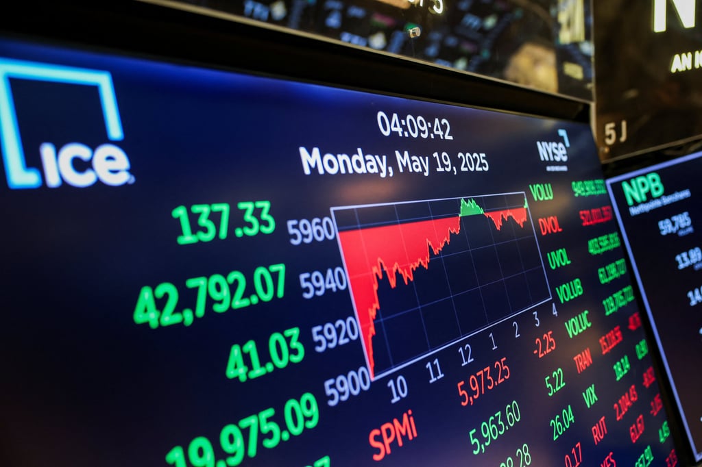 A screen shows trading indexes at the New York Stock Exchange (NYSE) in New York City, US, May 19, 2025. Photo: Reuters A screen shows trading indexes at the New York Stock Exchange (NYSE) in New York City, US, May 19, 2025. Photo: Reuters