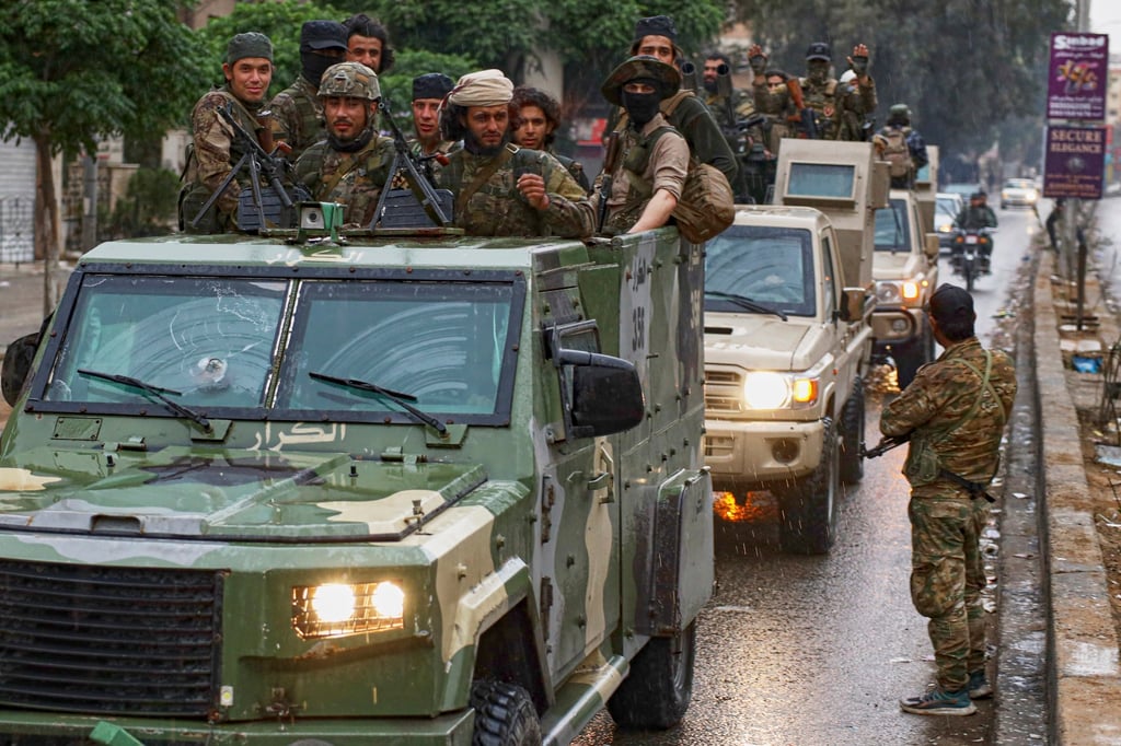 Syrian security forces deploy in a town south of Damascus after clashes with Druze fighters in April. Photo: AP Syrian security forces deploy in a town south of Damascus after clashes with Druze fighters in April. Photo: AP