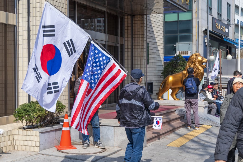 Far-right protesters hold up Korean and American flags, while chanting anti-China messages, during a demonstration in April following Yoon Suk-yeol’s impeachment. Photo: Kim Jung-yeop Far-right protesters hold up Korean and American flags, while chanting anti-China messages, during a demonstration in April following Yoon Suk-yeol’s impeachment. Photo: Kim Jung-yeop