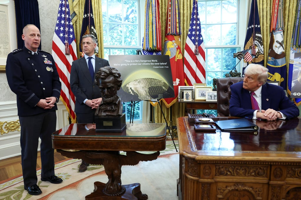 US Space Force General Michael Guetlein (right) speaks as US President Donald Trump makes an announcement regarding the Golden Dome missile defence shield in the Oval Office on Tuesday. Photo: Reuters US Space Force General Michael Guetlein (right) speaks as US President Donald Trump makes an announcement regarding the Golden Dome missile defence shield in the Oval Office on Tuesday. Photo: Reuters