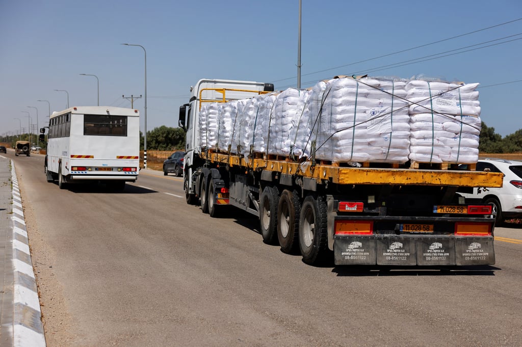 An aid truck entering from Israel into Gaza, on the road to the Kerem Shalom crossing near the Israeli-Gaza border on Wednesday. Photo: Reuters An aid truck entering from Israel into Gaza, on the road to the Kerem Shalom crossing near the Israeli-Gaza border on Wednesday. Photo: Reuters