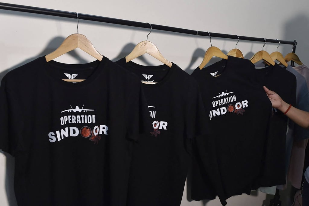 T-shirts featuring “Operation Sindoor” on display at a store in Ludhiana, India. Businesses have cashed in on the recent flare-up in the India-Pakistan conflict, offering military operation-themed T-shirts and tote bags. Photo: AFP T-shirts featuring “Operation Sindoor” on display at a store in Ludhiana, India. Businesses have cashed in on the recent flare-up in the India-Pakistan conflict, offering military operation-themed T-shirts and tote bags. Photo: AFP