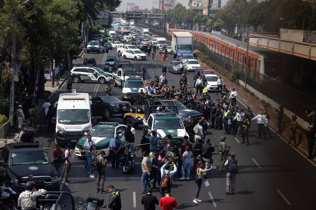 Police at the scene. Photo: Reuters Police at the scene. Photo: Reuters