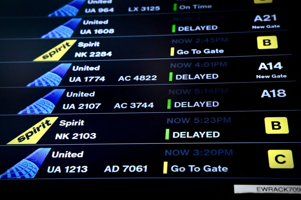 A screen displaying flight statuses is seen at Newark Liberty International Airport in New Jersey on May 7. Photo: AFP A screen displaying flight statuses is seen at Newark Liberty International Airport in New Jersey on May 7. Photo: AFP