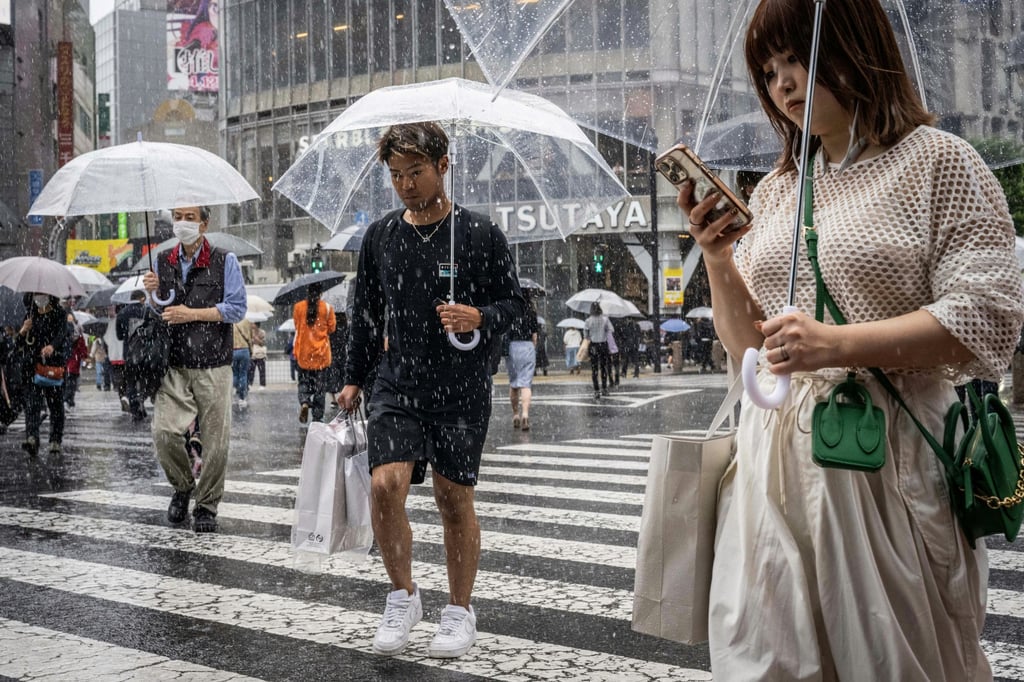 Pedestrians walk through Tokyo’s bustling Shibuya district, where police say romance scammers have lured disabled victims to fraudulent bars as part of a widening criminal scheme. Photo AFP Pedestrians walk through Tokyo’s bustling Shibuya district, where police say romance scammers have lured disabled victims to fraudulent bars as part of a widening criminal scheme. Photo AFP