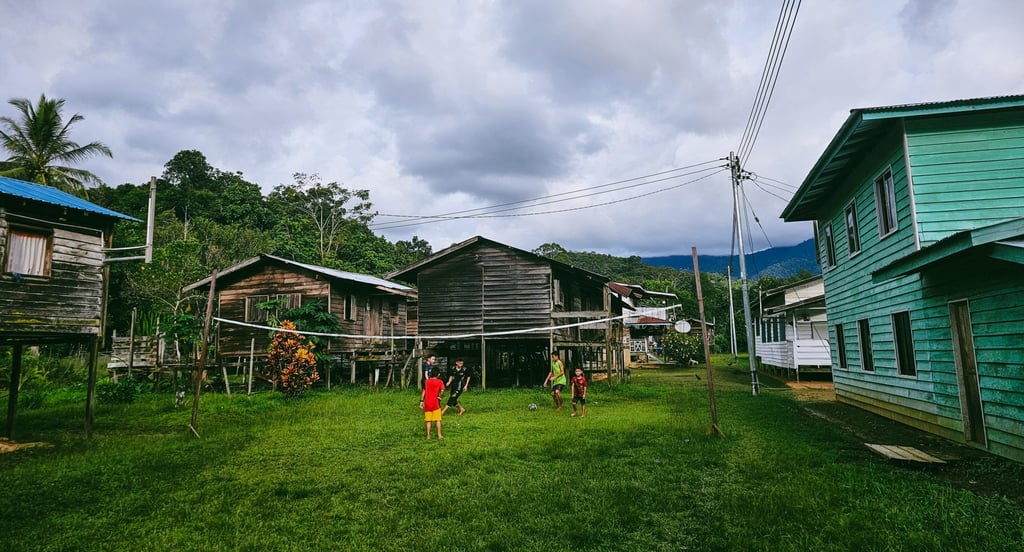 Children play volleyball in Long Kerong. Photo: Esslin Terrighena