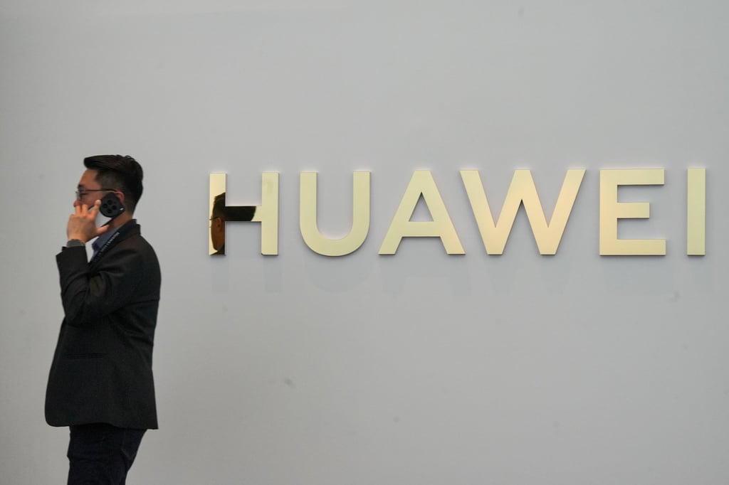A man speaks on the phone near a Huawei logo during a product launch in Kuala Lumpur, Malaysia, February 18, 2025. Photo: EPA-EFE A man speaks on the phone near a Huawei logo during a product launch in Kuala Lumpur, Malaysia, February 18, 2025. Photo: EPA-EFE