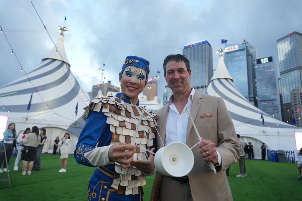 Duncan Fisher with a performer at the Central Harbourfront Event Space in Central, Hong Kong, where Cirque du Soleil will be performing Kooza until July 13. Photo: Sam Tsang