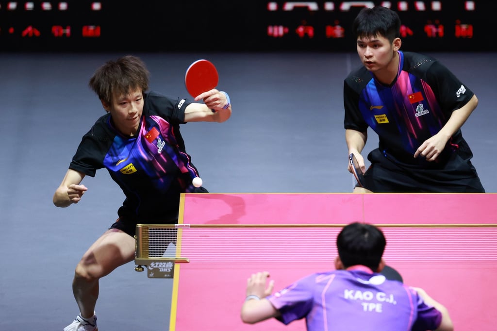 Lin Gaoyuan (top left) and Lin Shidong (top right) during the men’s doubles quarter-final. Photo: Xinhua