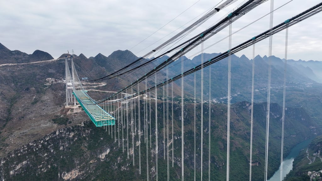 The 2,890-metre-long Huajiang grand canyon bridge in Guizhou is set to be the highest in the world after it is completed in 2025. Photo: VCG via Getty Images
