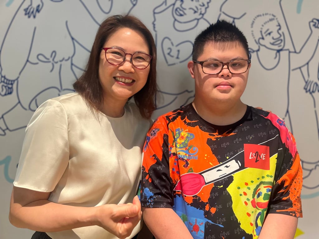 Eric Wong Hok-pan and his mother, Amy Chung, at Hong Kong charity Love 21 Foundation’s headquarters in San Po Kong. Photo: Kylie Knott