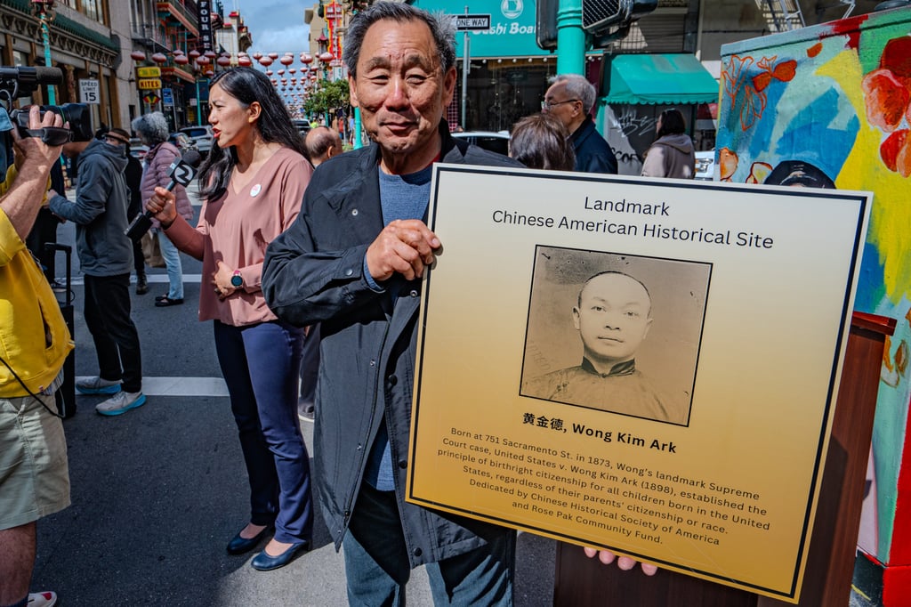 Norman Wong, holding a plaque commemorating his great-grandfather Wong Kim Ark, whose landmark 1898 US Supreme Court case confirmed that anyone born in the United States is a citizen. Photo: Chinese for Affirmative Action Norman Wong, holding a plaque commemorating his great-grandfather Wong Kim Ark, whose landmark 1898 US Supreme Court case confirmed that anyone born in the United States is a citizen. Photo: Chinese for Affirmative Action