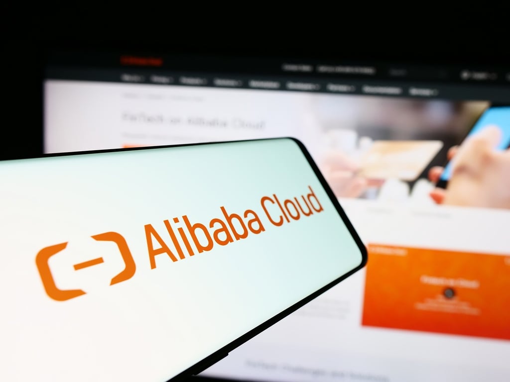 A smartphone screen displays the Alibaba Cloud logo. Photo: Shutterstock Images A smartphone screen displays the Alibaba Cloud logo. Photo: Shutterstock Images
