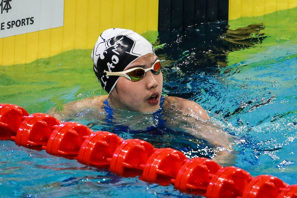Yu Zidi catches her breath after her 200m freestyle semi-final in Shenzhen. Photo: AFP Yu Zidi catches her breath after her 200m freestyle semi-final in Shenzhen. Photo: AFP