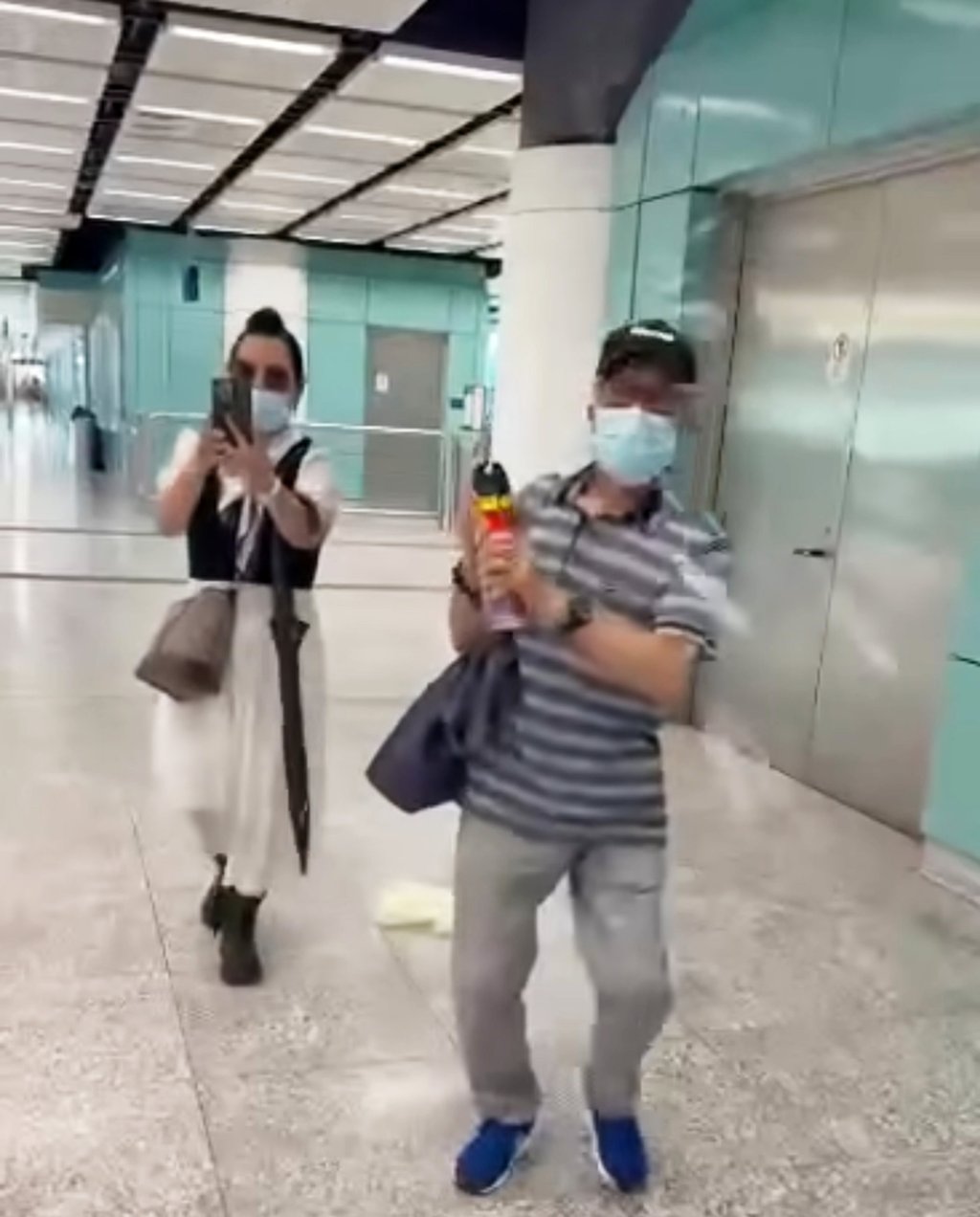 Online footage shows ‘Mr Ho’ allegedly spraying the insecticide towards the person filming. Photo: Handout Online footage shows ‘Mr Ho’ allegedly spraying the insecticide towards the person filming. Photo: Handout