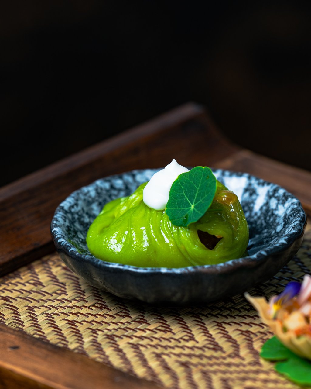 Stir-fried chicken in steamed rice paper dumpling from Baan Lao. Photo: Handout Stir-fried chicken in steamed rice paper dumpling from Baan Lao. Photo: Handout
