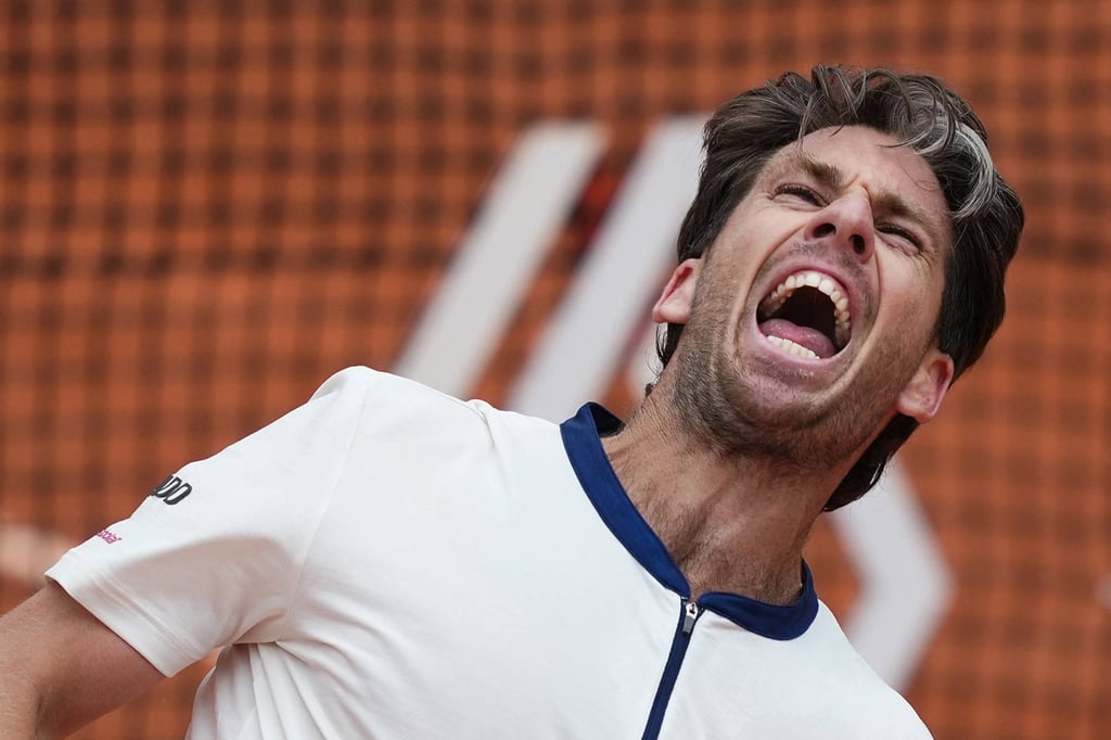 Cameron Norrie celebrates his victory over Daniil Medvedev on Court Simonne-Mathieu. Photo: AFP
