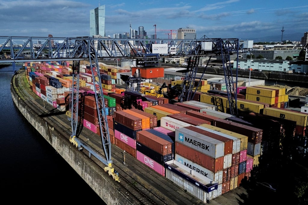 Containers are seen at a cargo terminal in Frankfurt. Germany’s current account surplus exceeded US$280 billion last year, largely thanks to trade. Photo: AP Containers are seen at a cargo terminal in Frankfurt. Germany’s current account surplus exceeded US$280 billion last year, largely thanks to trade. Photo: AP