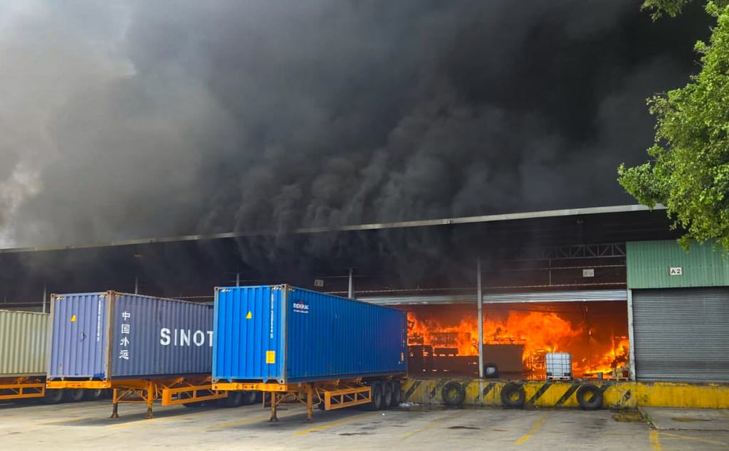 About 100 firefighters are currently trying to bring a No 3 alarm fire under control. Photo: Handout About 100 firefighters are currently trying to bring a No 3 alarm fire under control. Photo: Handout