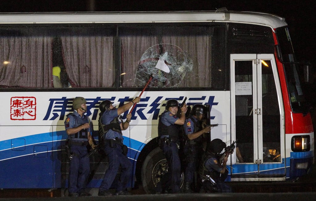 A gunman shot dead eight Hongkongers after hijacking a tour bus in Manila in August 2010. Photo: EPA A gunman shot dead eight Hongkongers after hijacking a tour bus in Manila in August 2010. Photo: EPA