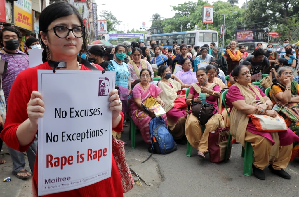People attend a protest against violence against women, in Kolkata, India. Photo: EPA-EFE People attend a protest against violence against women, in Kolkata, India. Photo: EPA-EFE