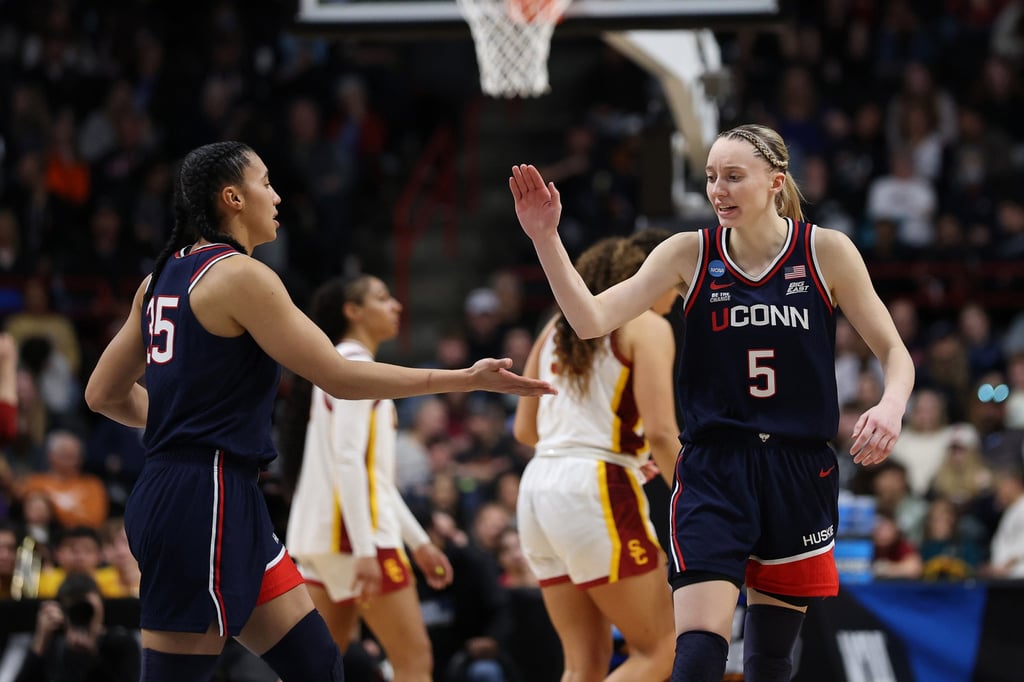 Paige Bueckers with UConn Huskies teammate Azzi Fudd during their NCAA championship game on March 31. Photo: Getty Images via TNS