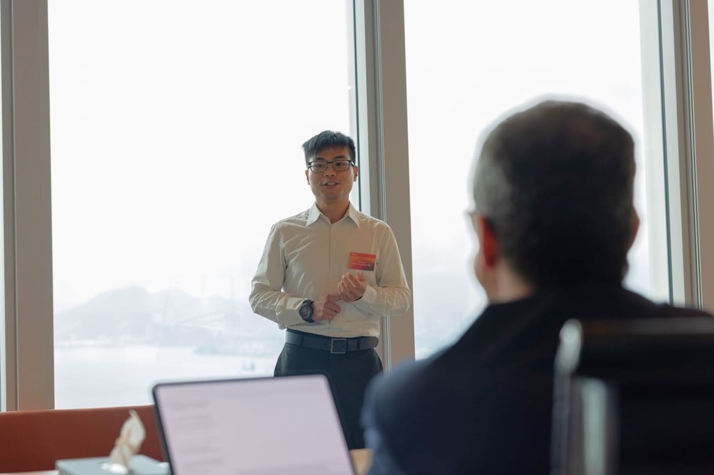 Bill Chan, co-founder of Alcarbo Technologies, pitches to jurors during the Finalist Showcase.