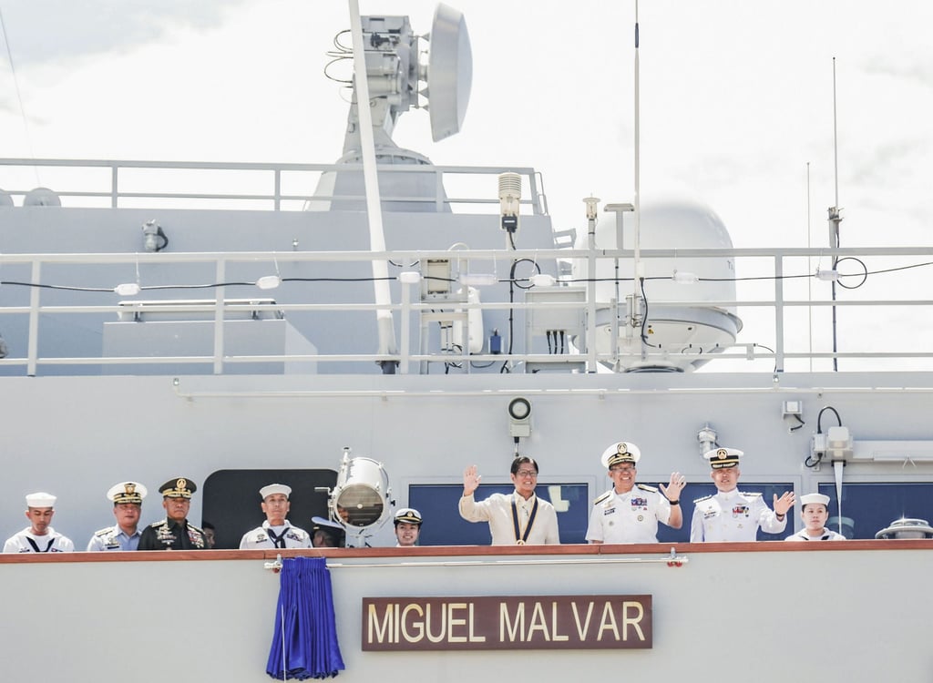 Philippine President Ferdinand Marcos Jnr (centre) waves from a newly built warship at Subic naval base on May 20. Photo: Kyodo Philippine President Ferdinand Marcos Jnr (centre) waves from a newly built warship at Subic naval base on May 20. Photo: Kyodo
