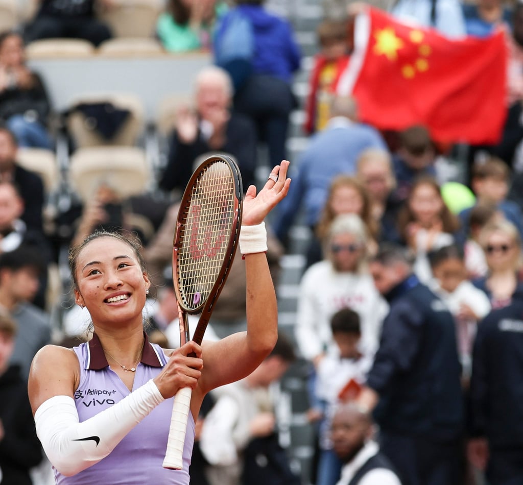 Zheng Qinwen celebrates after beating Emiliana Arango of Colombia on Wednesday. Photo: Xinhua