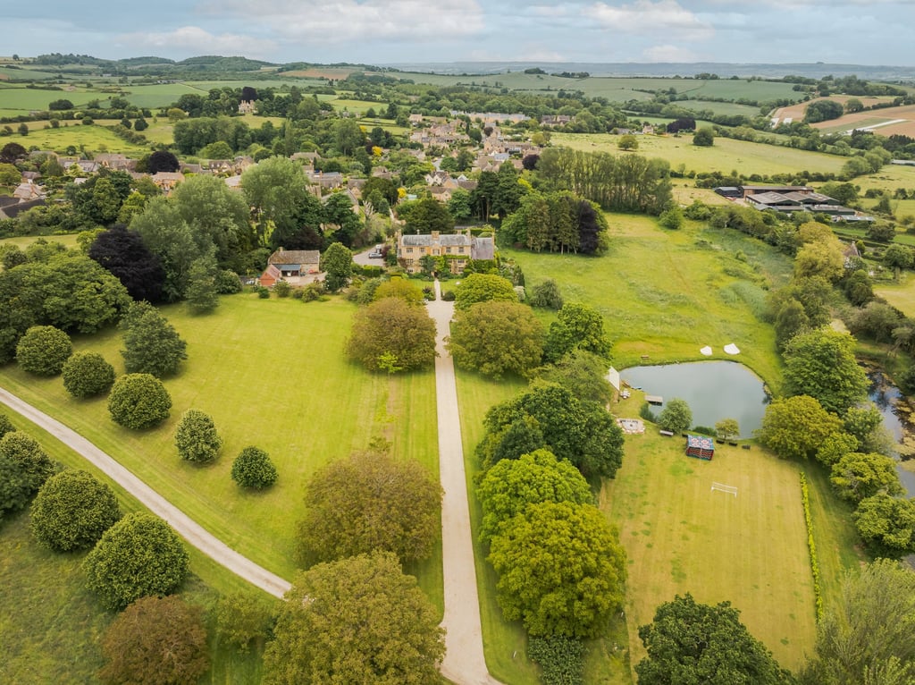 The 80-hectare grounds include a lake fed by a natural spring, a boathouse, rose gardens and an orchard. Photo: Nick Church Photography