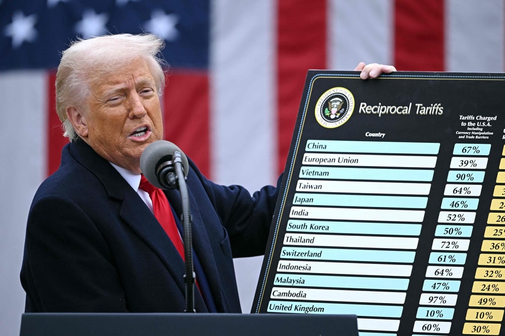 Donald Trump holds a chart outlining “reciprocal” tariffs at the White House on April 2. Photo: AFP Donald Trump holds a chart outlining “reciprocal” tariffs at the White House on April 2. Photo: AFP