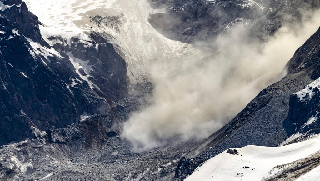 A view of the Kleines Nesthorn mountain on Thursday showing the trace of the rocks which broke off and slid towards the valley above the village of Blatten. Photo: AP A view of the Kleines Nesthorn mountain on Thursday showing the trace of the rocks which broke off and slid towards the valley above the village of Blatten. Photo: AP