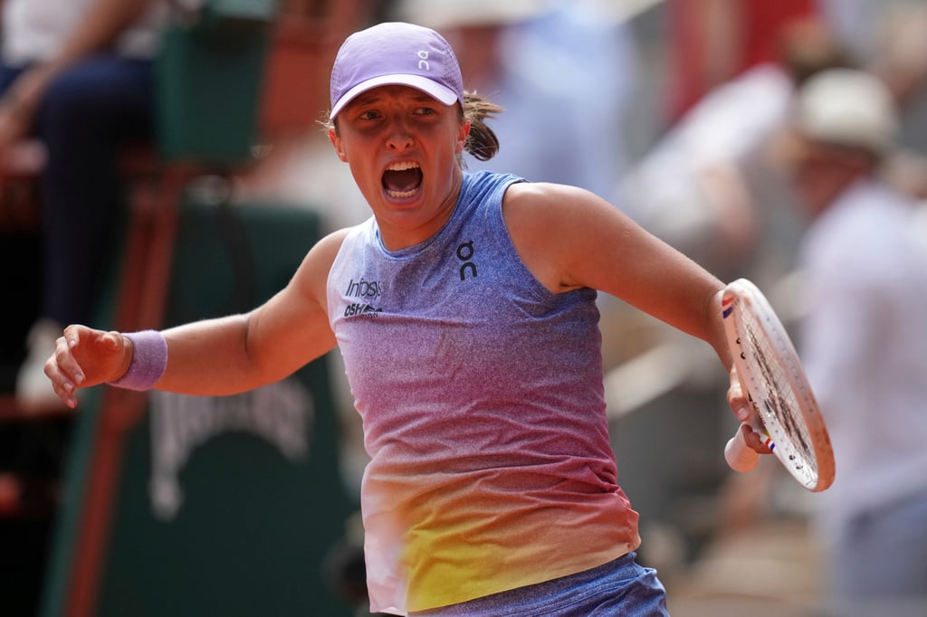 Poland’s Iga Swiatek celebrates after battling past Elena Rybakina. Photo: AP