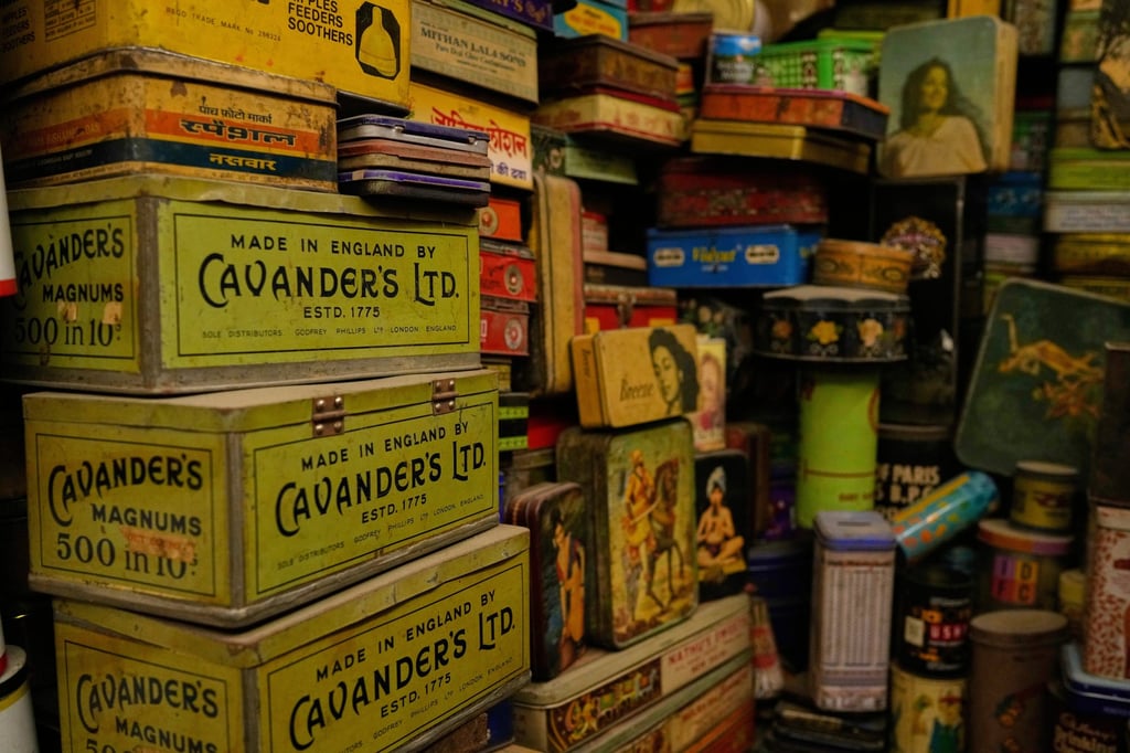 Old tin boxes and cigarette cases stacked up in Vij’s home. Photo: AP Old tin boxes and cigarette cases stacked up in Vij’s home. Photo: AP