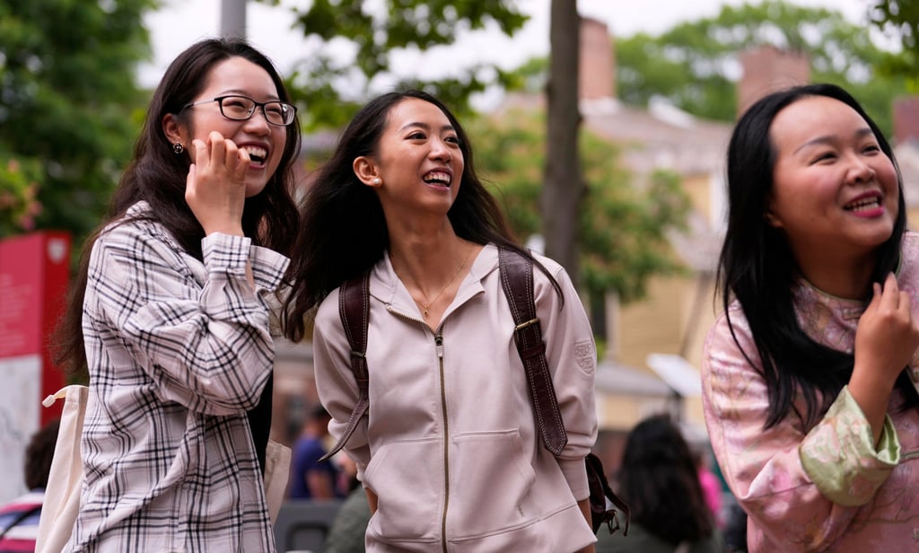 Yurong “Luanna” Jiang, center, who delivered a speech at her Harvard University commencement, jokes with her college friends Helen Ji (left) and Cynthia Luo on May 30, 2025, in Cambridge, Massachusetts. Photo: AP Yurong “Luanna” Jiang, center, who delivered a speech at her Harvard University commencement, jokes with her college friends Helen Ji (left) and Cynthia Luo on May 30, 2025, in Cambridge, Massachusetts. Photo: AP