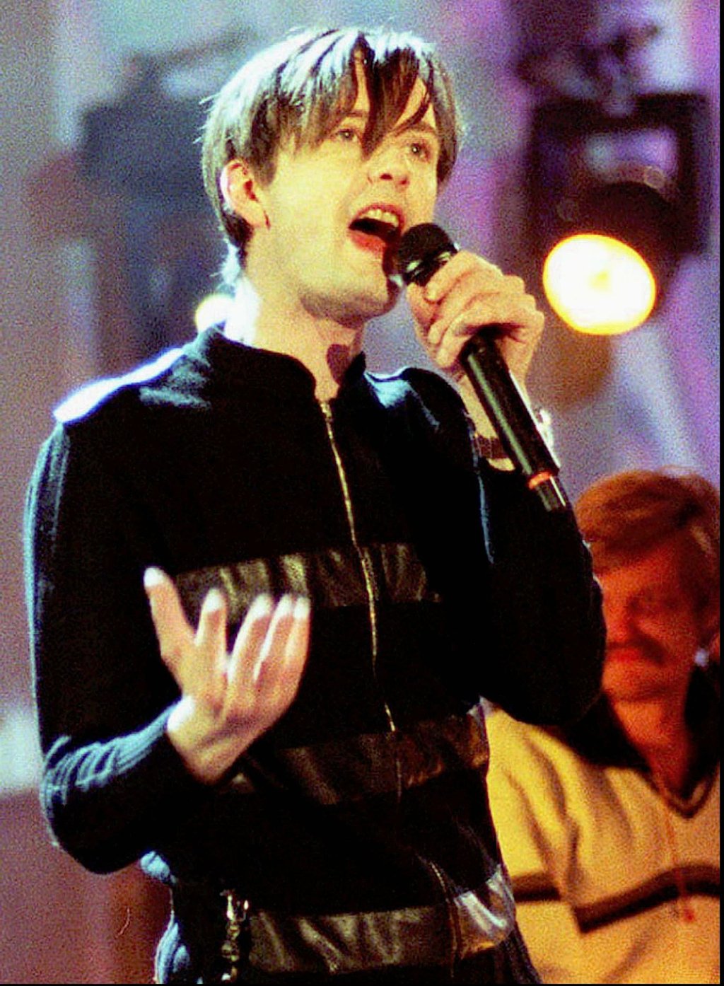 Jarvis Cocker, lead singer of British band Pulp, performs at the Brit Awards in 1996. Photo: AP Jarvis Cocker, lead singer of British band Pulp, performs at the Brit Awards in 1996. Photo: AP